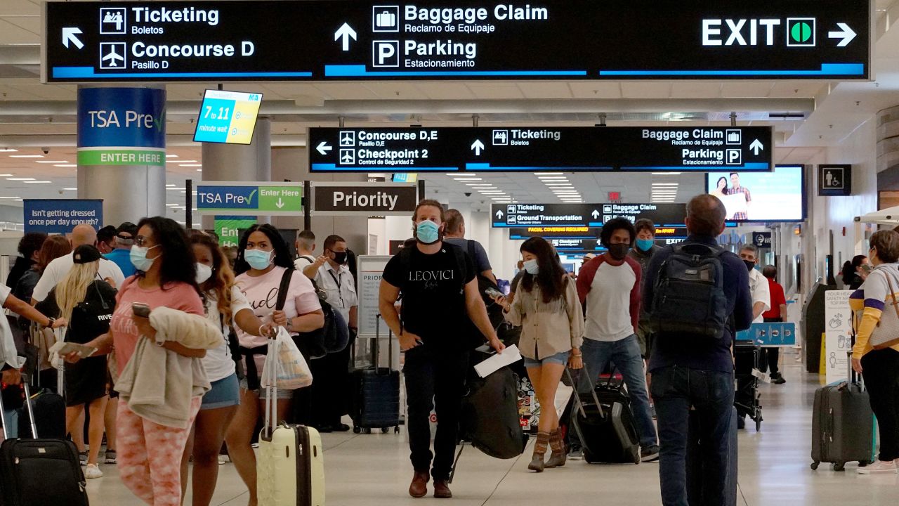 Travelers make their way through the Miami International Airport on September 3, 2021 in Miami, Florida.