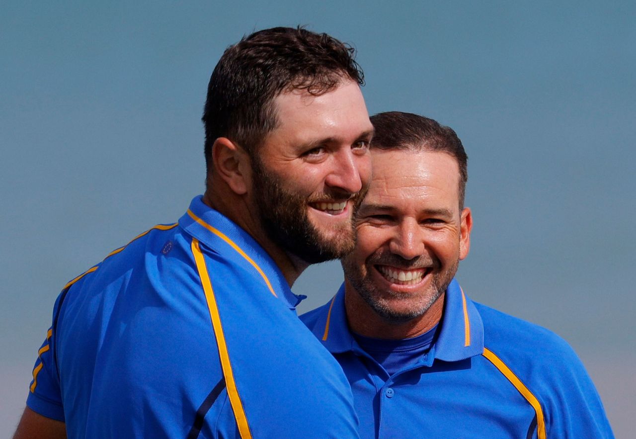 Team Europe's Jon Rahm and Sergio Garcia celebrate on the 17th green after winning their match during the Foursomes on Friday. 