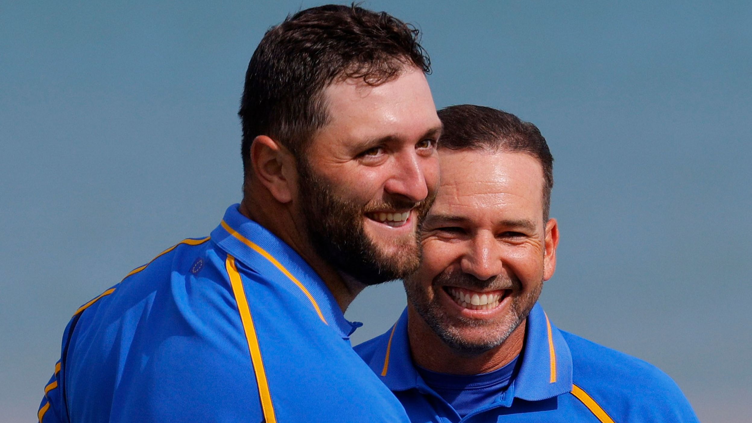 Team Europe's Jon Rahm and Sergio Garcia celebrate on the 17th green after winning their match during the Foursomes on Friday. 