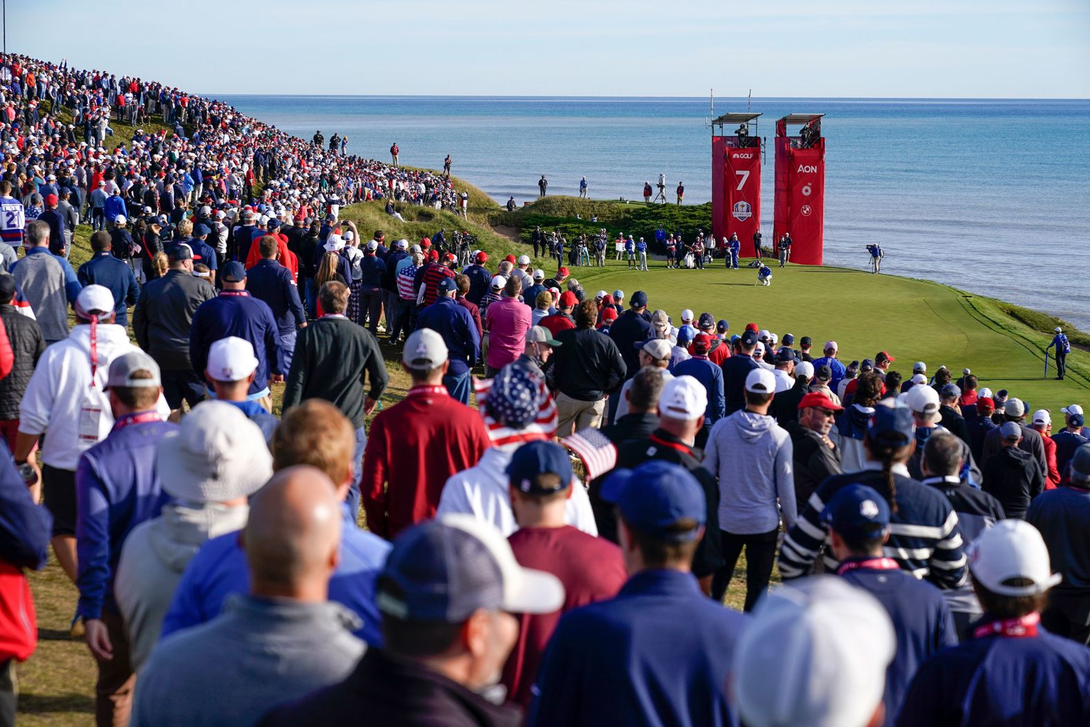 Rahm lines up a putt on the seventh hole.