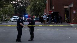 Crime scene tape is seen outside of a Kroger grocery store where a shooting occurred on September 23, 2021 in Collierville, Tennessee. The Kroger is where authorities said that a gunman had apparently killed himself after opening fire inside of the store killing one person and injuring 12 others.