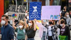 DUSSELDORF, GERMANY - SEPTEMBER 24: Protesters march to demand aggressive policies towards fighting climate change at a Fridays for Future march on September 24, 2021 in Dusseldorf, Germany. Similar protest marches are taking place across Europe today, with dozens in Germany alone. Germany is to hold federal parliamentary elections on September 26 and climate policy is high on the agenda of salient voter issues. (Photo by Lukas Schulze/Getty Images)