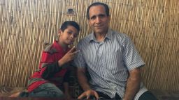 10-year-old Noman Mujtaba with his father Bahaudin Mujtaba