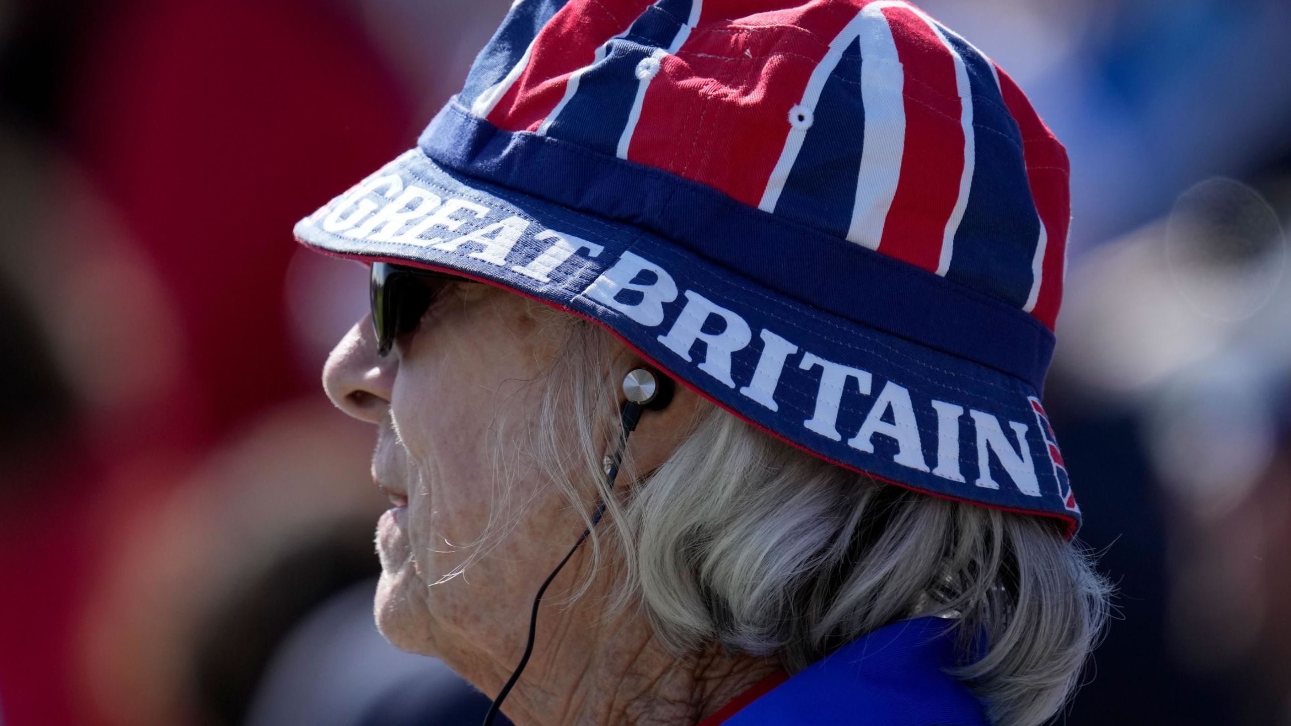 A fan watches on the eighth hole during a fourball match.