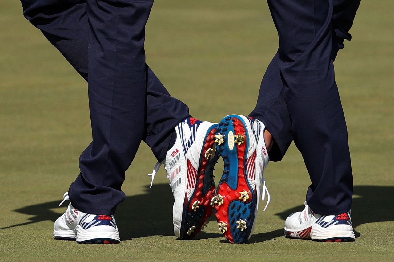 A view of the shoes worn by US pair Dustin Johnson and Collin Morikawa during Saturday morning's Foursome matches.