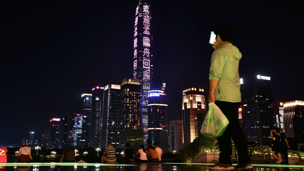 Shenzhen's tallest skyscraper, the Ping An Finance Centre, is lit up with a message welcoming Meng Wanzhou home.