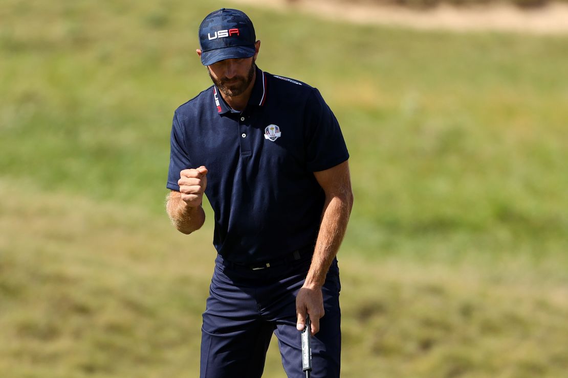 Johnson celebrates on the second green during the Saturday morning Foursome matches.