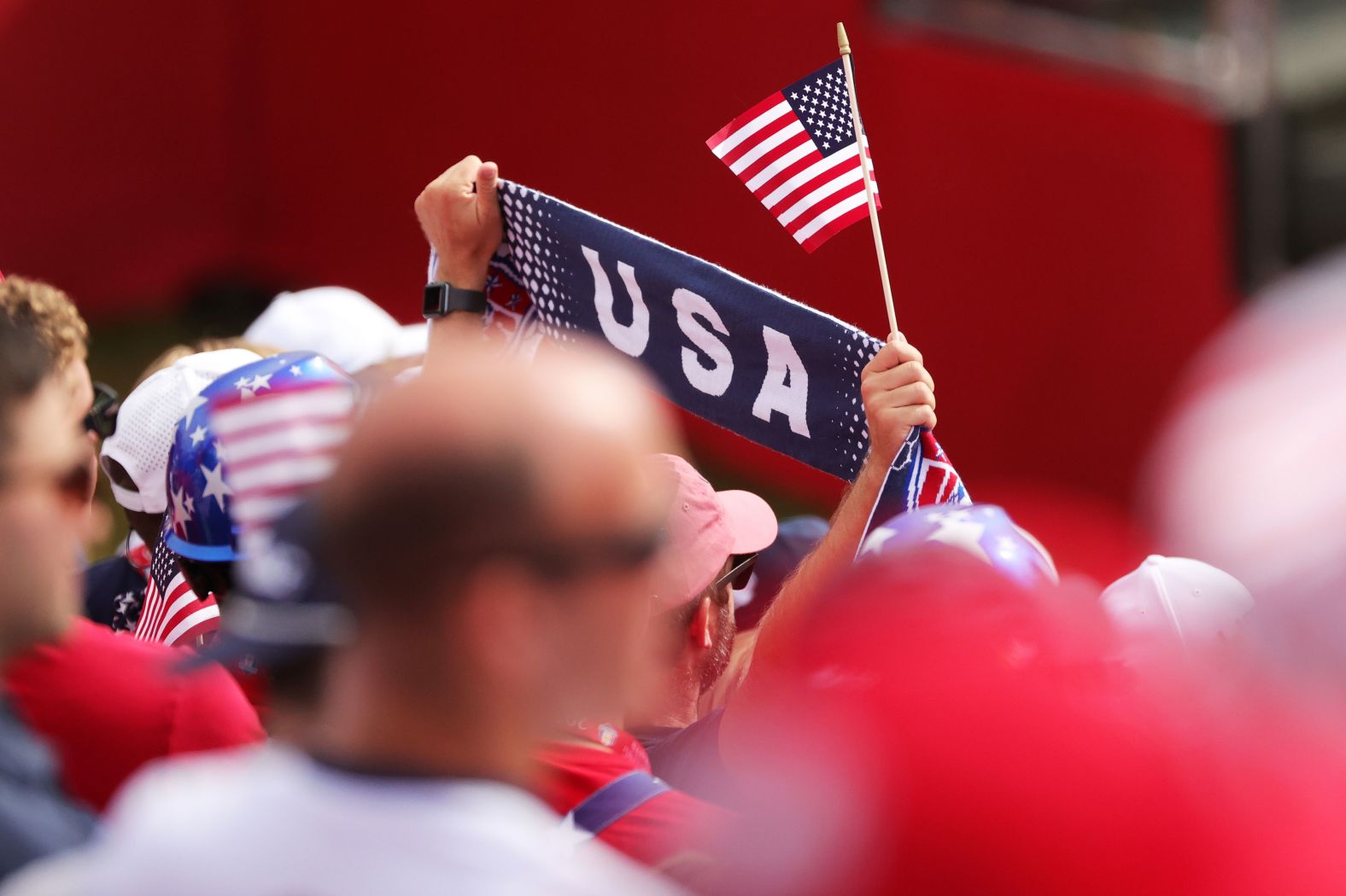 Fans cheer from the first tee grandstand during Sunday Singles matches.