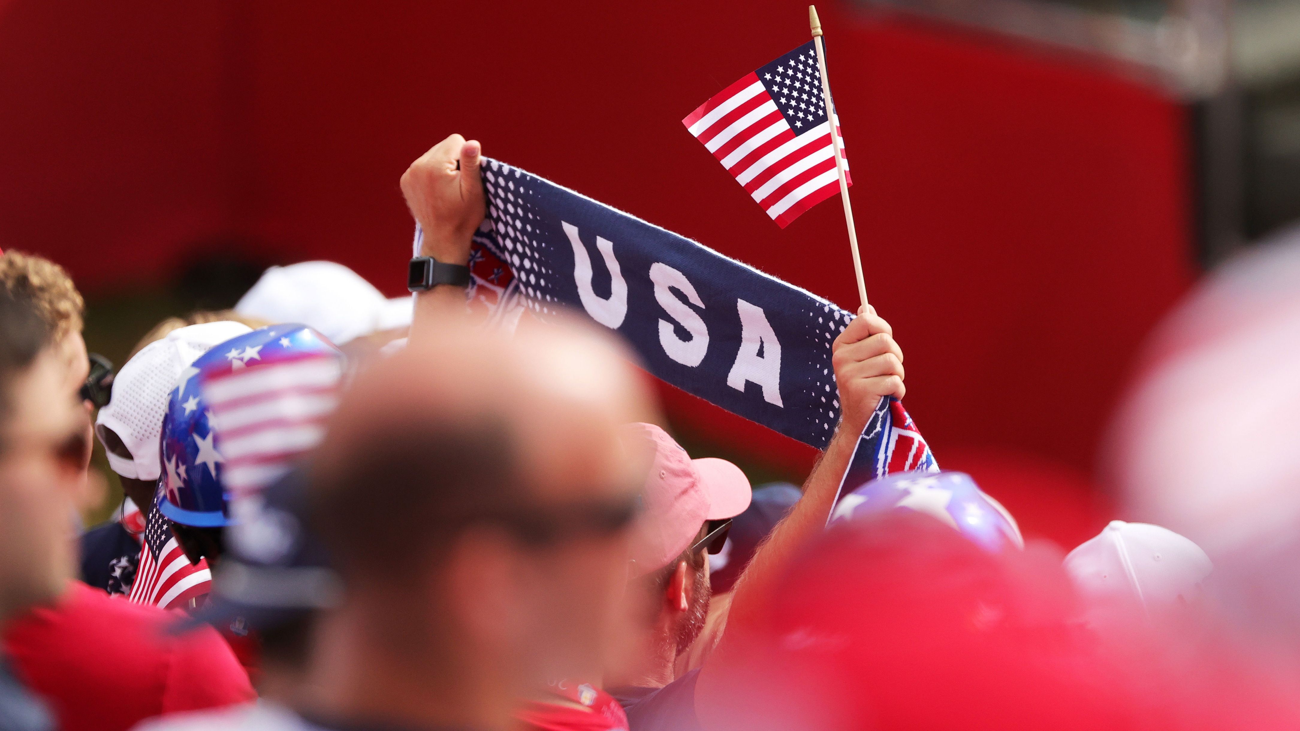 Fans cheer from the first tee grandstand during Sunday Singles matches.