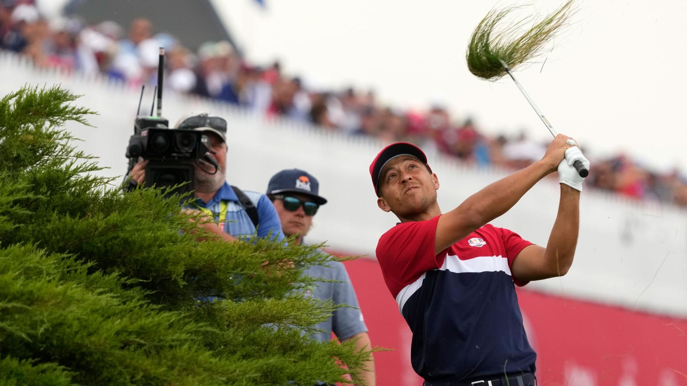Morikawa hits on the 15th hole.