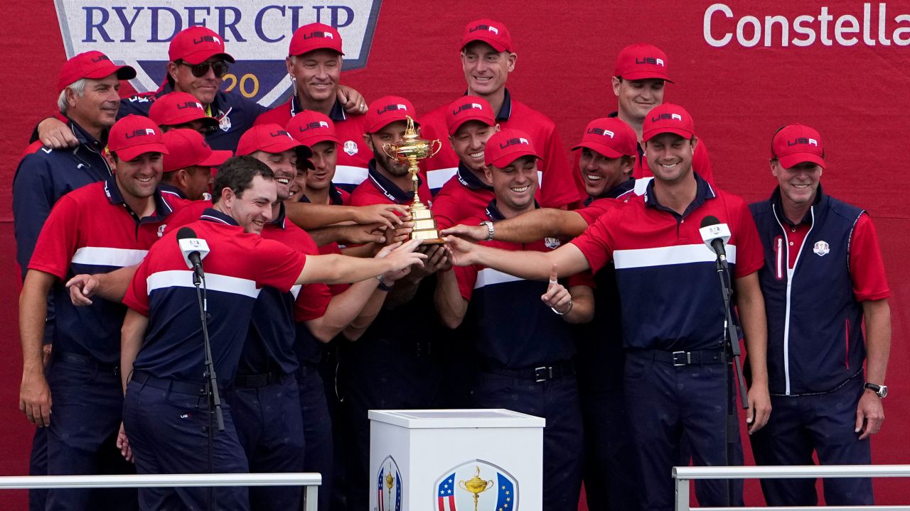 Team US poses with the trophy at the closing ceremony of the Ryder Cup.