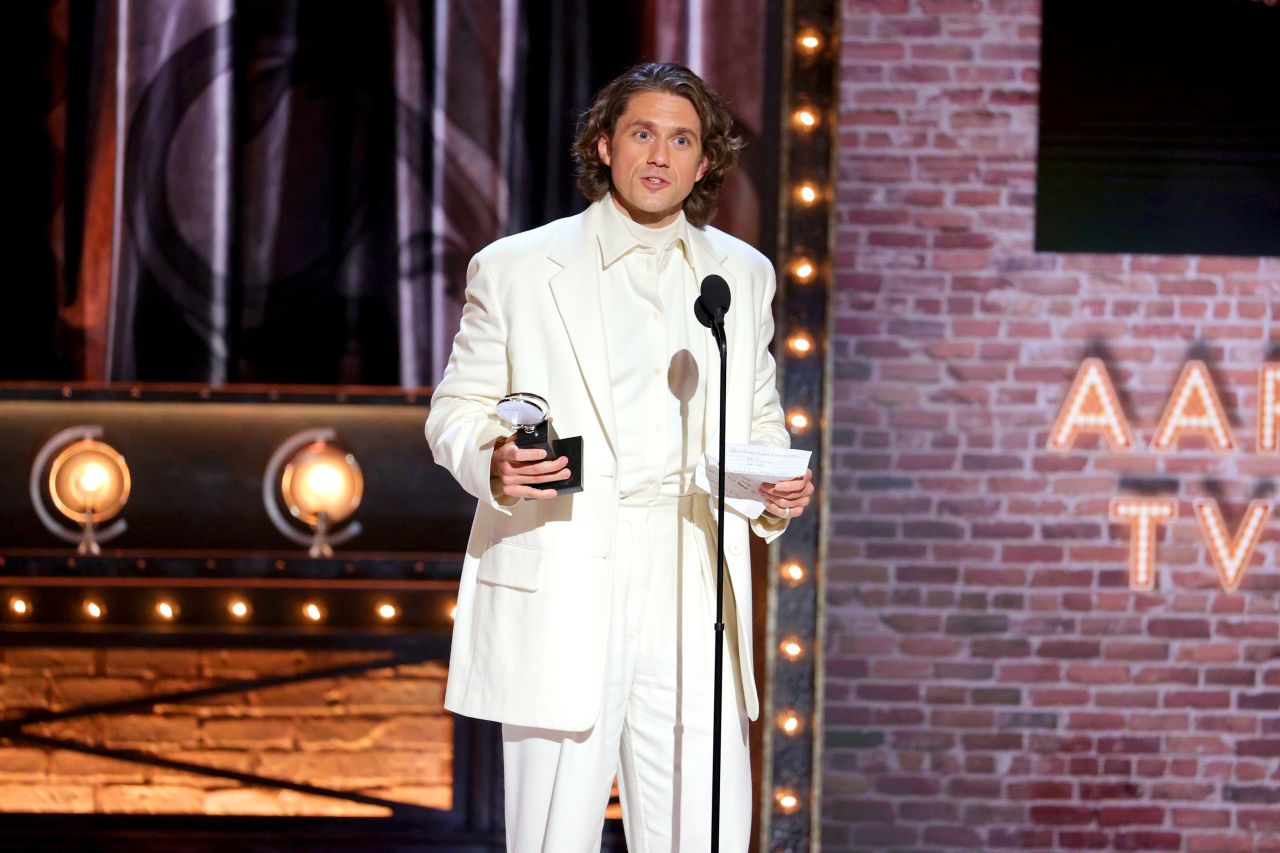 Aaron Tveit accepts the award for best performance by an actor in a leading role in a musical for "Moulin Rouge! The Musical."
