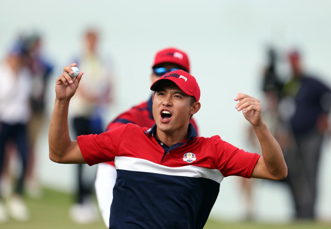 Morikawa celebrates on the 17th green after winning the hole to go one up and guarantee the half point needed for the US to win the Ryder Cup. 