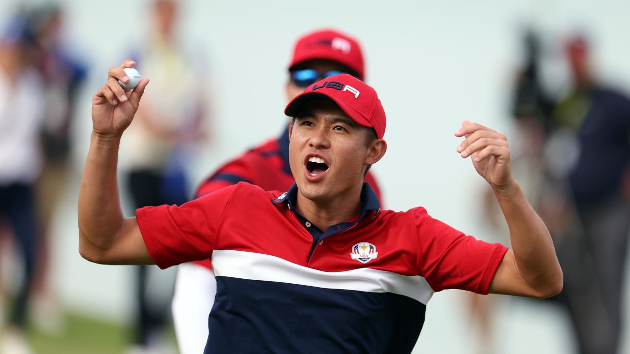 Morikawa celebrates on the 17th green after winning the hole to go one up and guarantee the half point needed for the US to win the Ryder Cup. 