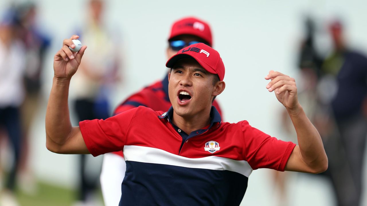 Morikawa celebrates on the 17th green after winning the hole to go one up and guarantee the half point needed for the US to win the Ryder Cup.
