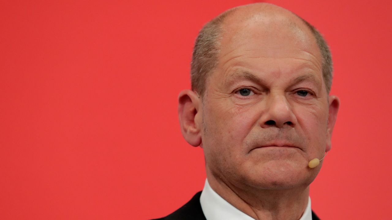 Olaf Scholz, top candidate for chancellor of the Social Democratic Party (SPD) addresses his supporters after German parliament election at the party's headquarters in Berlin, Sunday, Sept. 26, 2021. (AP Photo/Lisa Leutner)