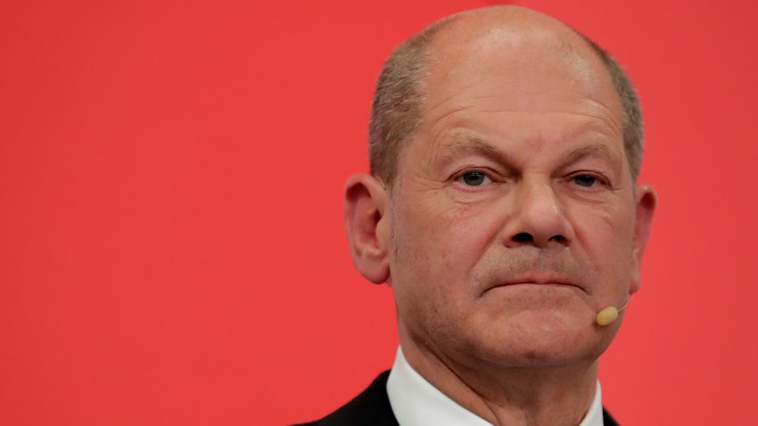 Olaf Scholz, top candidate for chancellor of the Social Democratic Party (SPD) addresses his supporters after German parliament election at the party's headquarters in Berlin, Sunday, Sept. 26, 2021. (AP Photo/Lisa Leutner)