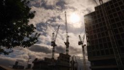 Cranes at a construction site in Stratford, U.K., on Thursday, Sept. 23, 2021. 