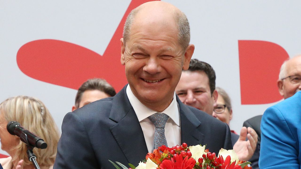 Olaf Scholz, the SPD's candidate for chancellor, on stage a day after the Bundestag elections.