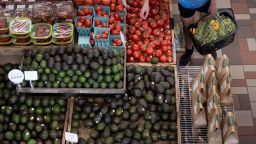 A person shops for produce at an area grocery store August 12, 2021 in Washington, DC.