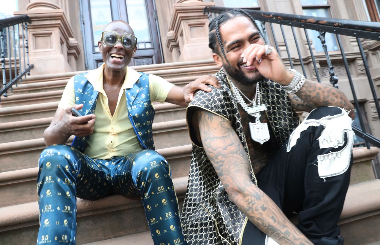 Daniel Day and rapper Dave East perch outside of Day's atelier in September 2021.