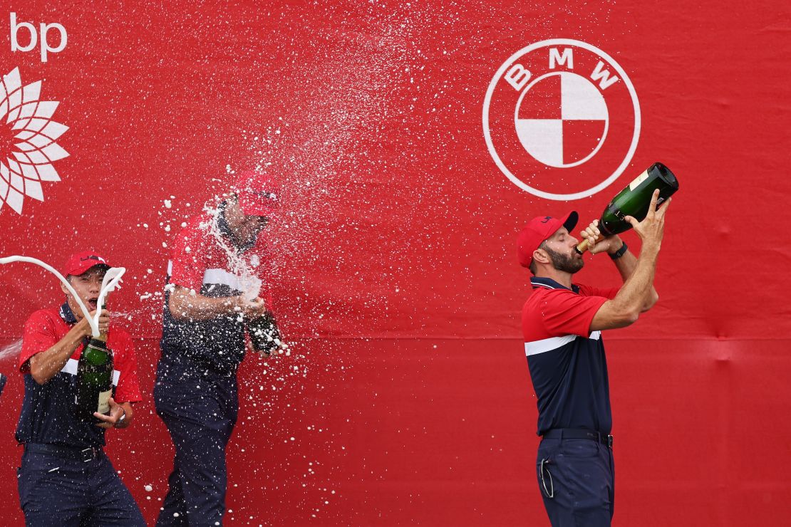 Johnson celebrates with champagne after defeating Team Europe at the 43rd Ryder Cup.