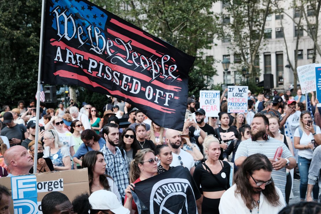 People participate in a rally and march against Covid-19 mandates on September 13, 2021, in New York City.