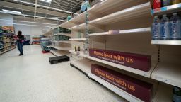 Empty shelves are seen at a supermarket in Manchester, Britain, on Sept. 22, 2021.  British Environment Secretary George Eustice said on Wednesday that the food industry could face a sharp price rise in carbon dioxide CO2 even though the government reached an interim deal with a major producer to restart CO2 production.