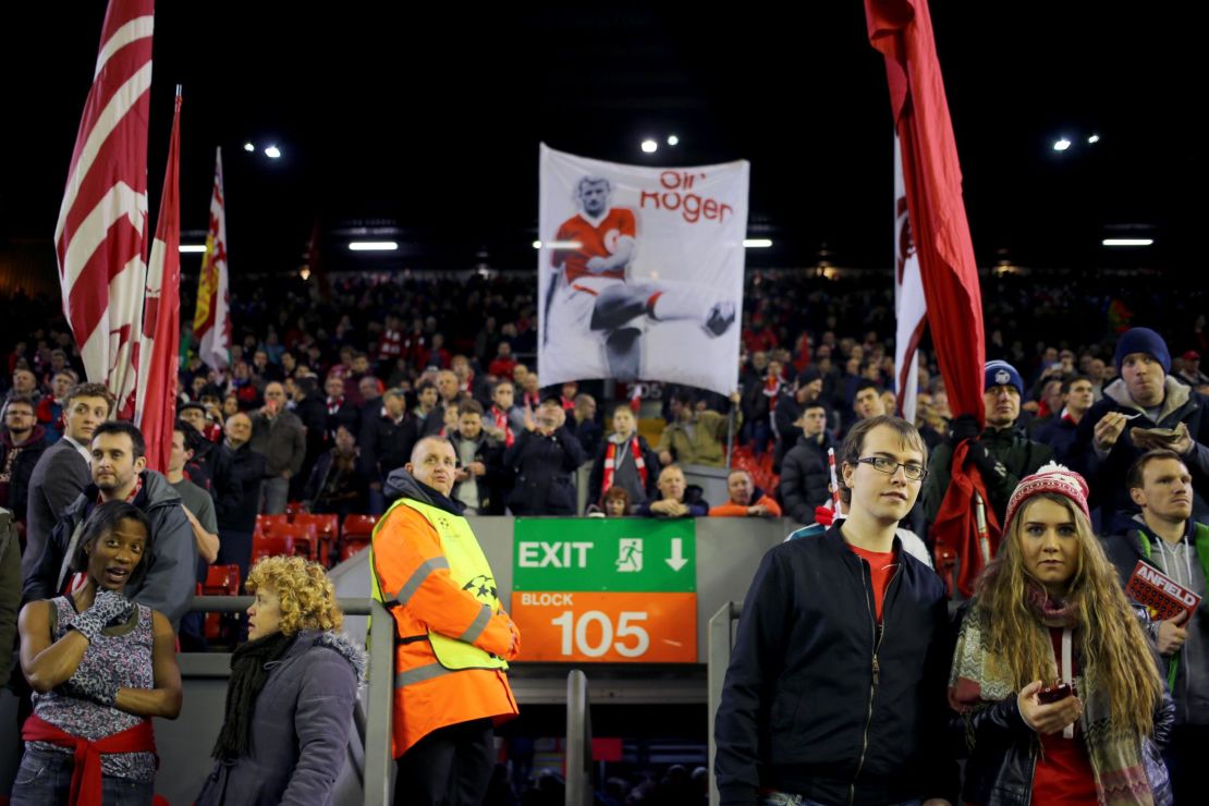 Liverpool fans on The Kop at Anfield with a banner of Sir Roger Hunt on Dec. 9, 2014. 
