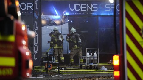 Firefighters work at the site of an explosion in central Gothenburg on September 28, 2021. 
