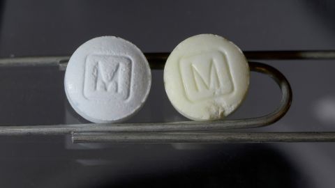 30mg authentic, left, and counterfeit Oxycodone