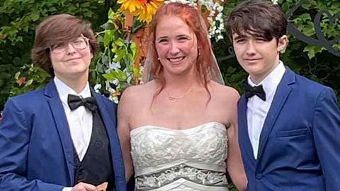 Mahoney poses with her two children at the full ceremony on September 25.