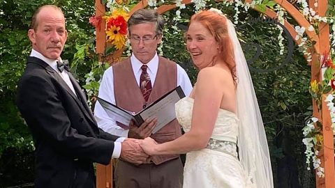Ray and Mahoney exchange vows at their Saturday ceremony.
