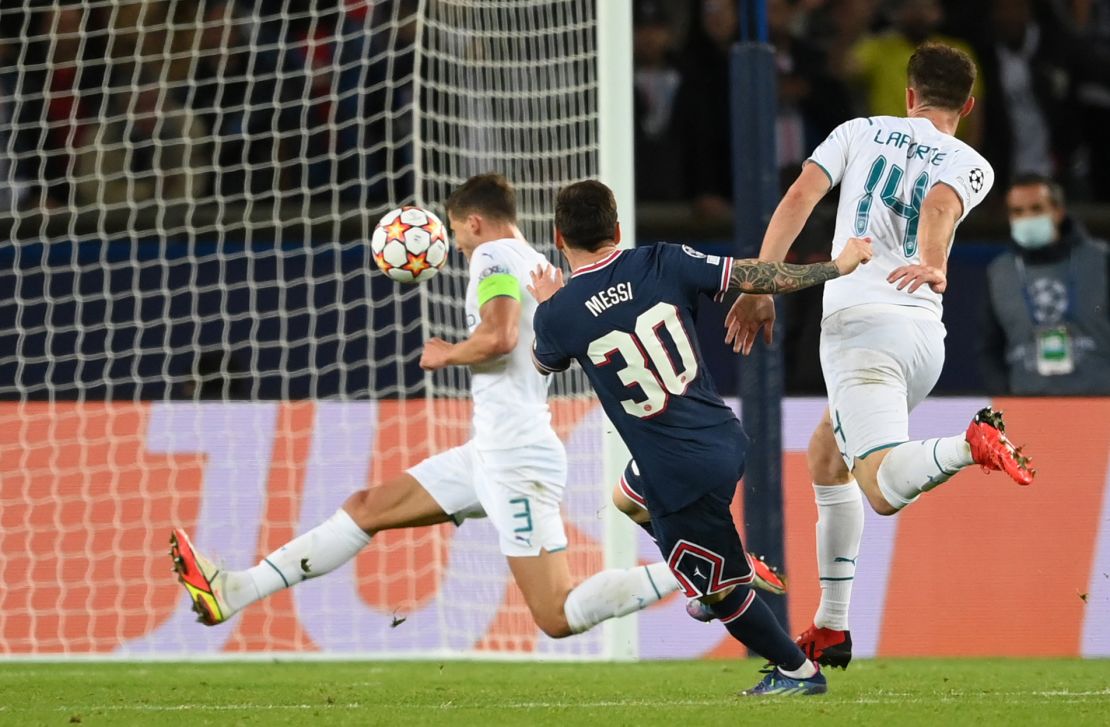 Lionel Messi scores PSG's second goal against Manchester City in the Champions League at the Parc des Princes on September 28, 2021.
