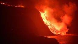 Lava from a volcano reaches the sea on the Canary island of La Palma, Spain in the early hours of Sept. 29, 2021. Lava from the new volcano on the Canary Island of La Palma reached the Atlantic ocean last night, at the area known as Los Guirres beach, also known as Playa Nueva (New Beach). 