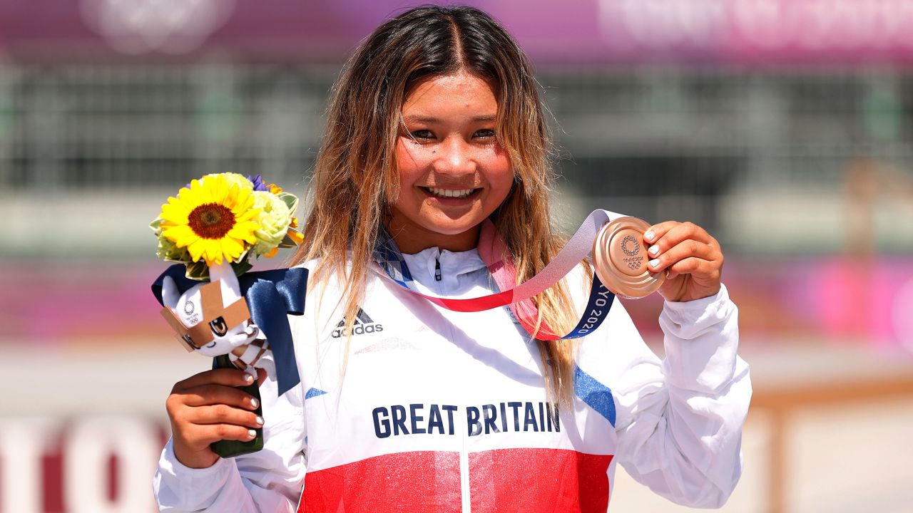 Brown poses with her Olympic bronze at Ariake Urban Sports Park.