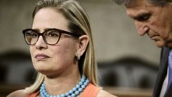 Sens. Kyrsten Sinema (D-Ariz.) and Joe Manchin (D-W.Va.) during a news conference with fellow members of a bipartisan group of Senate negotiators after the Senate voted to take up a $1 trillion bipartisan infrastructure bill, on Capitol Hill in Washington on July 28, 2021.