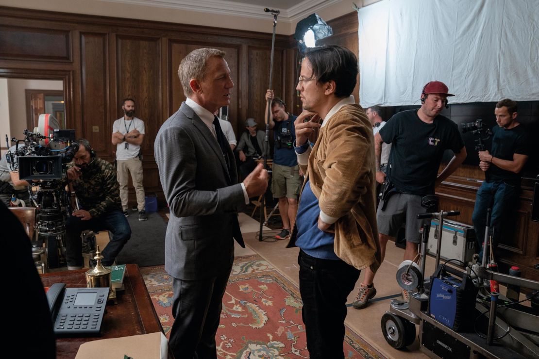 Daniel Craig and writer-director Cary Joji Fukunaga talk on set.