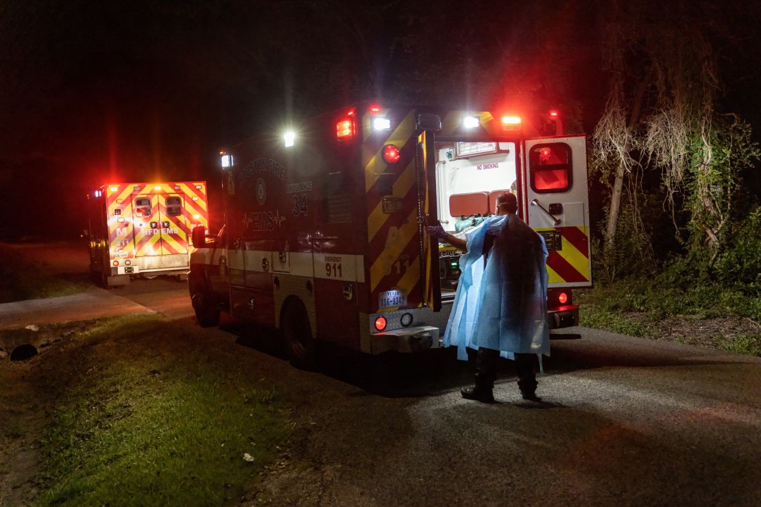 An EMS medic from the Houston Fire Department transports a Covid-19 patient on August 24.