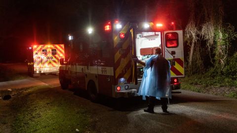 An EMS medic from the Houston Fire Department transports a Covid-19 patient on August 24.