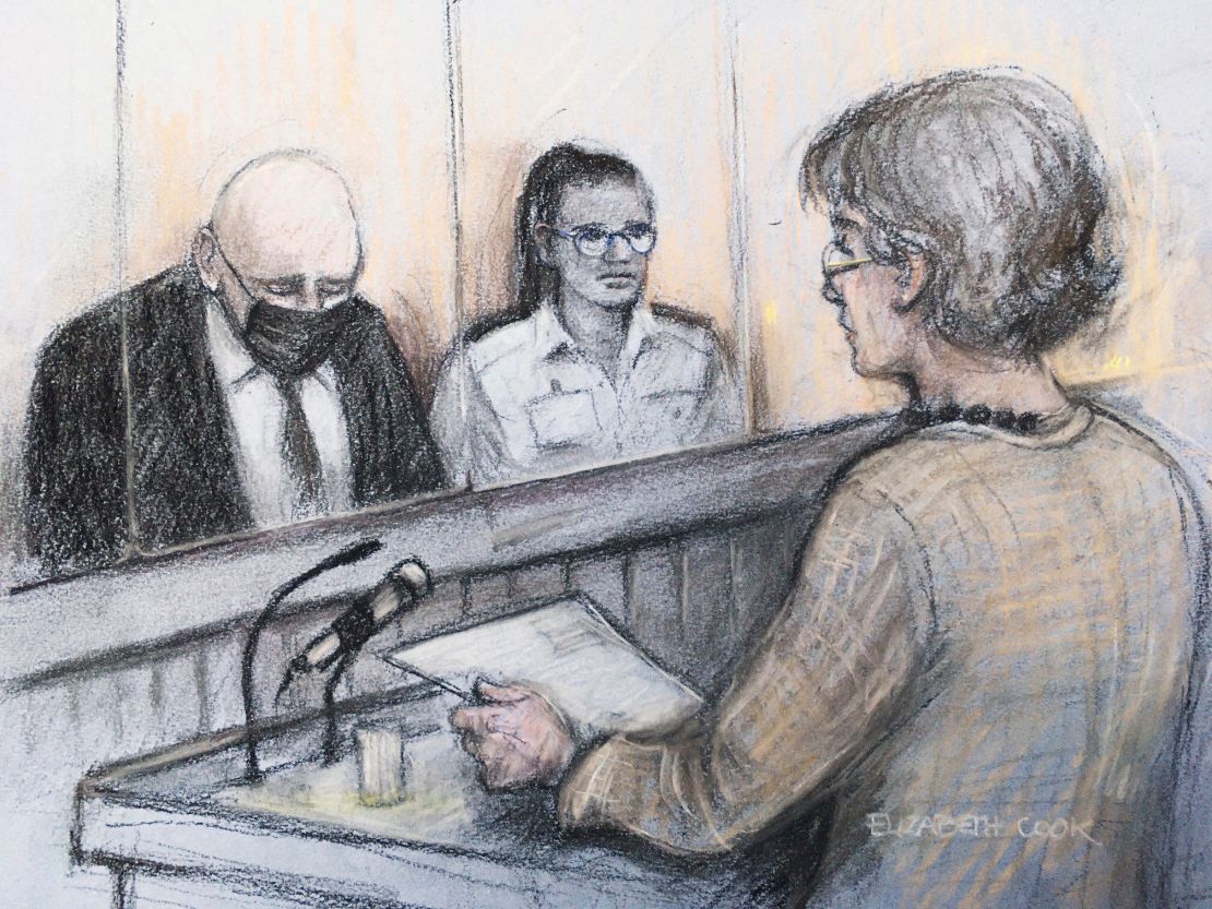 In this court sketch provided on September 29, Susan Everard, right, the mother of Sarah Everard, reads a victim impact statement as Wayne Couzens, left, sits in the dock.