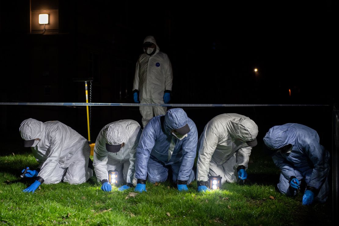 Police officers conduct a fingertip search in the hunt for Everard on March 9 in London.
