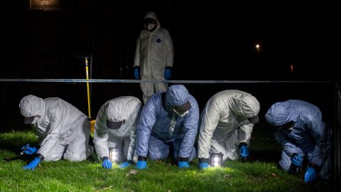 Police officers conduct a fingertip search in the hunt for Everard on March 9 in London.
