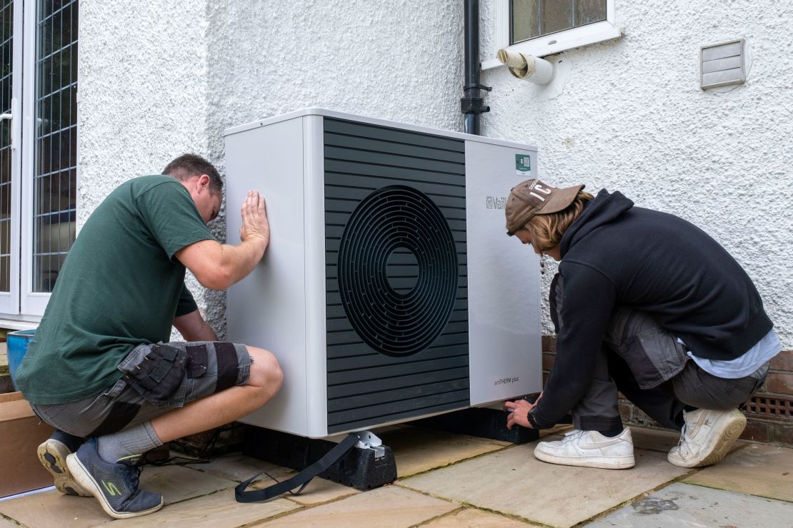 An air source heat pump unit is installed at a 1930s-built house in Folkestone, England, on September 20, 2021.