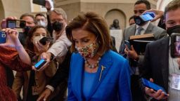 House Speaker Nancy Pelosi of Calif. arrives at the U.S. Capitol, Thursday, Sept. 30, 2021, in Washington. Pelosi indicated she may shelve a Thursday vote on a $1 trillion public works bill without movement on Biden's package.