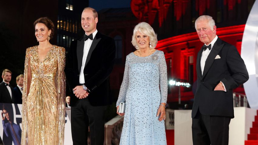 Britain's Prince William, Duke of Cambridge (2L) and Britain's Catherine, Duchess of Cambridge (L) stand with Britain's Prince Charles, Prince of Wales (R) and Britain's Camilla, Duchess of Cornwall as they arrive for the World Premiere of the James Bond 007 film "No Time to Die" at the Royal Albert Hall in west London on September 28, 2021. - Celebrities and royals walk the red carpet in central London on Tuesday for the star-studded but much-delayed world premiere of the latest James Bond film, "No Time To Die". (Photo by Chris Jackson / POOL / AFP) (Photo by CHRIS JACKSON/POOL/AFP via Getty Images)