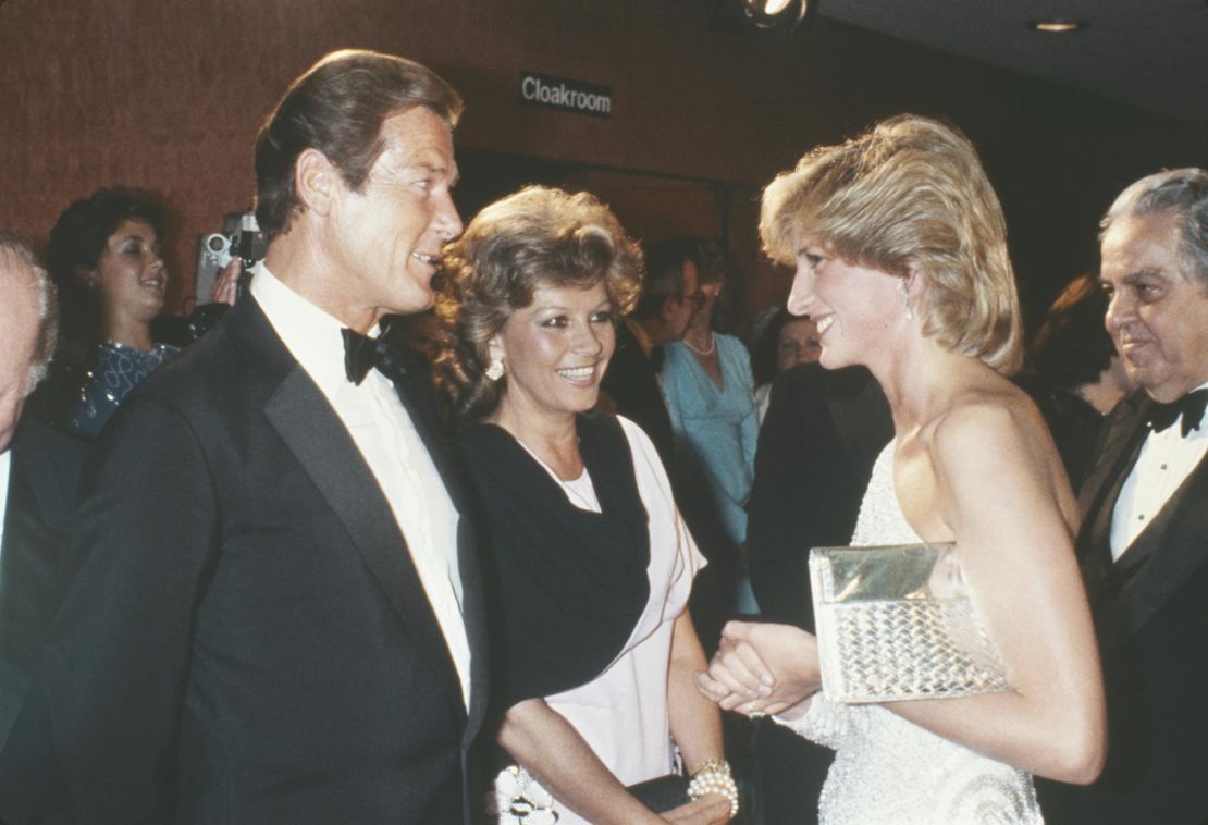 And in 1983, Diana met actor Roger Moore and his wife Luisa at the premiere of "Octopussy."