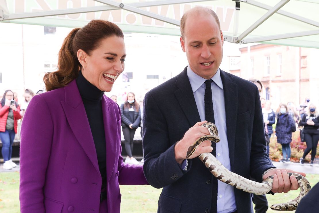The Duke of Cambridge handles a snake during a tour of Ulster University's Magee Campus.