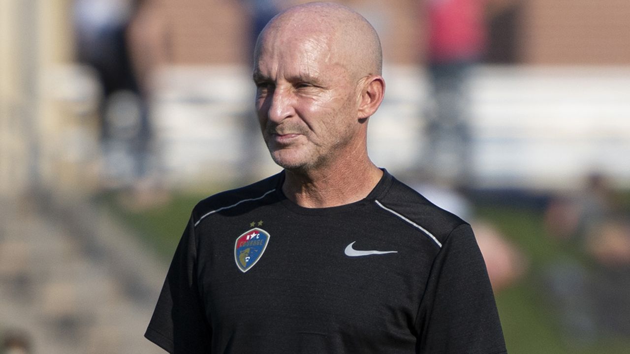 Paul Riley, former head coach of the North Carolina Courage, watches warm ups before a game between North Carolina Courage and Kansas City at Legends Field on September 5, 2021 in Kansas City, Kansas.