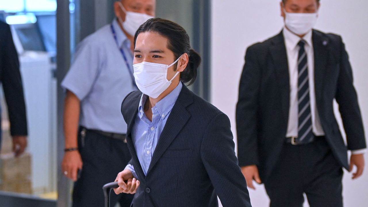 Kei Komuro arrives at Narita airport on September 27 ahead of his October 26 wedding to Japan's Princess Mako.
